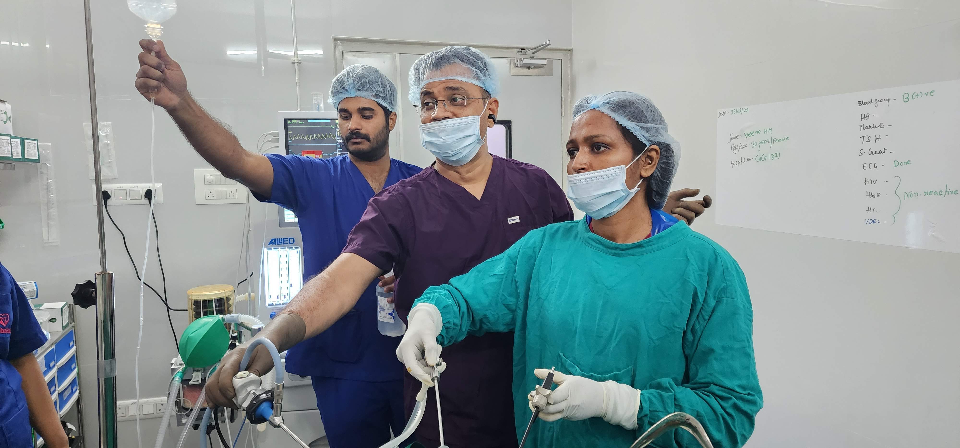 Dr. Rashmi T N performing laparoscopic surgery at GarbhaGruha Health Center, Bangalore