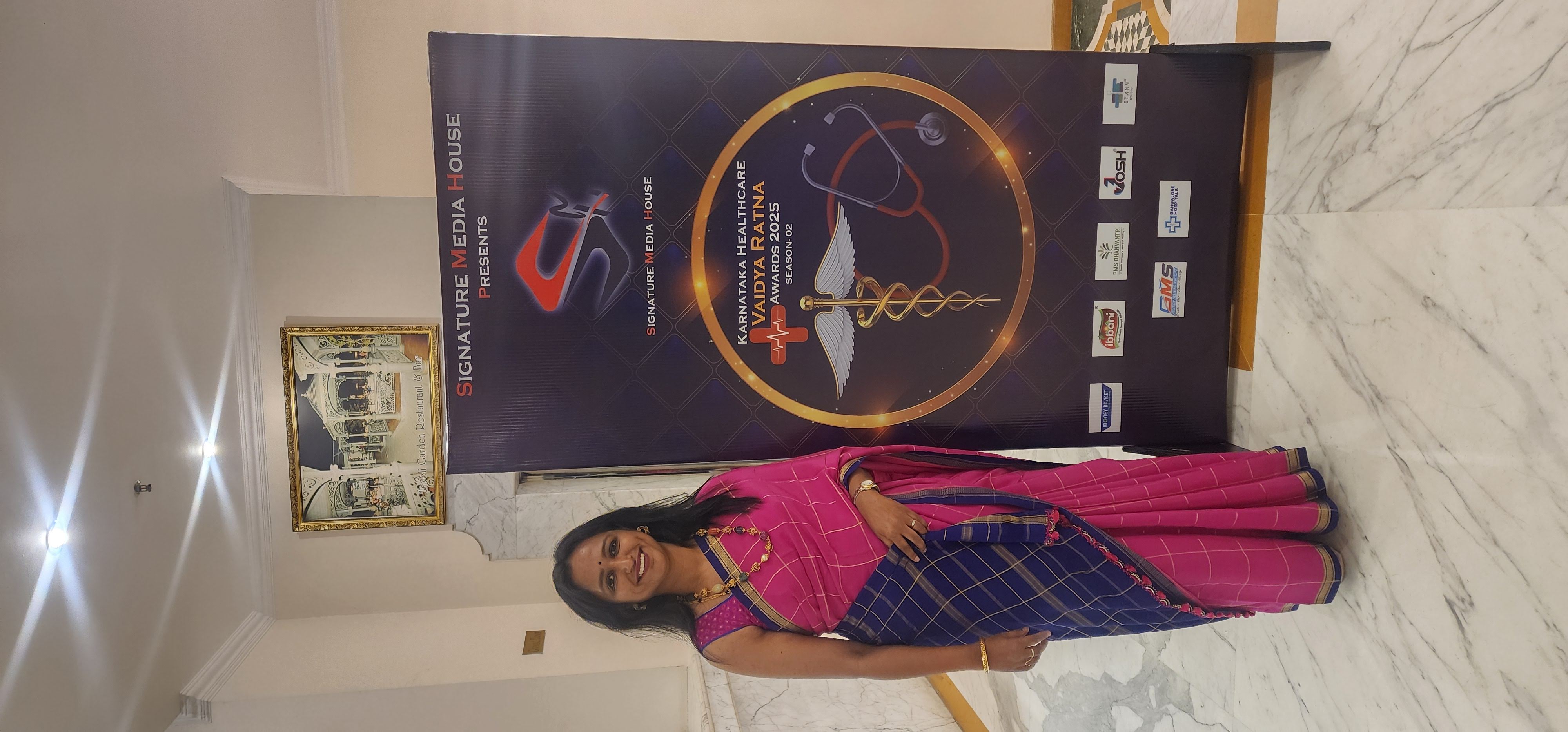 Dr. Rashmi T N with the Vaidya Ratna Award 2025